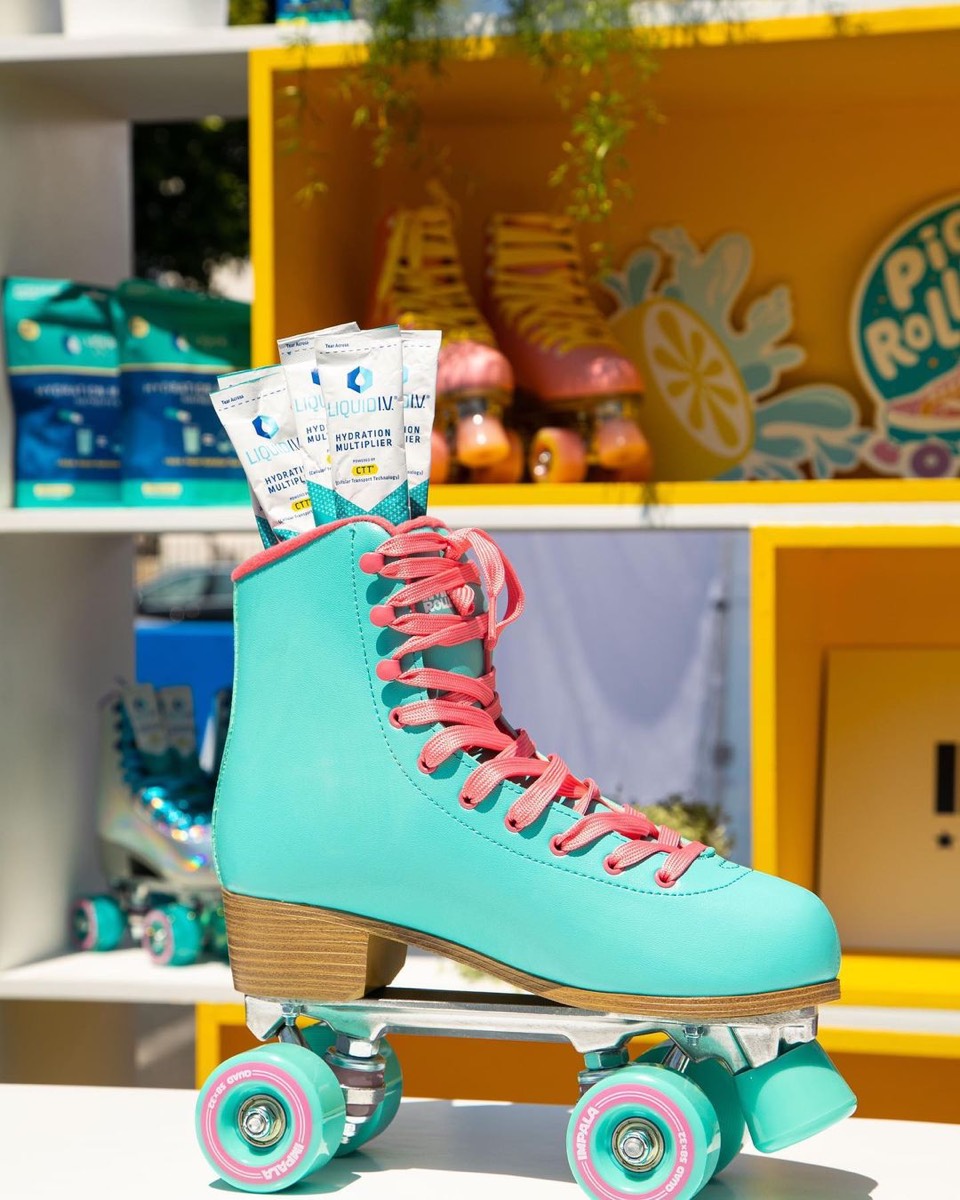 Liquid I.V. sticks tucked into a roller skate