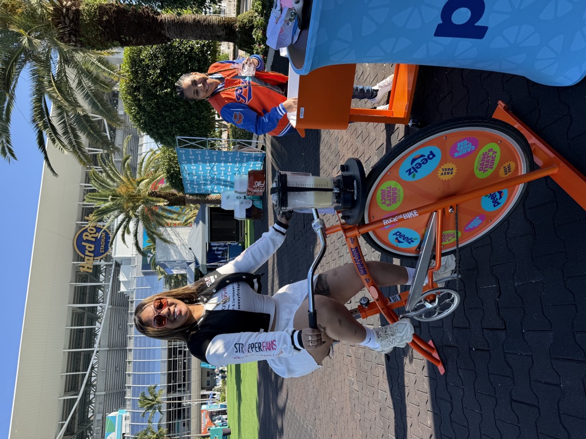 A guest pedalling the Peelz blender bike in Miami